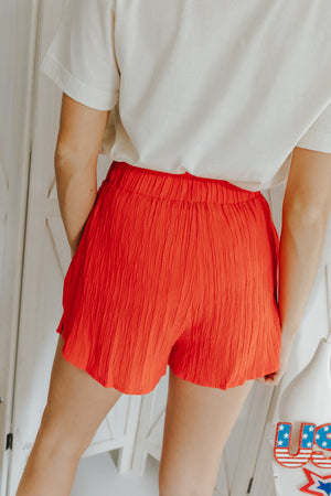 "Dim The Streetlights" Coral Textured Shorts